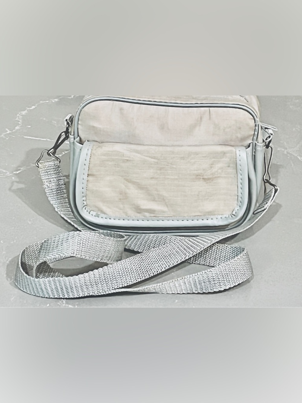 Cross body zippered carryall w/ 2 sections 40” strap + belt loop 7X5X2 1/2”